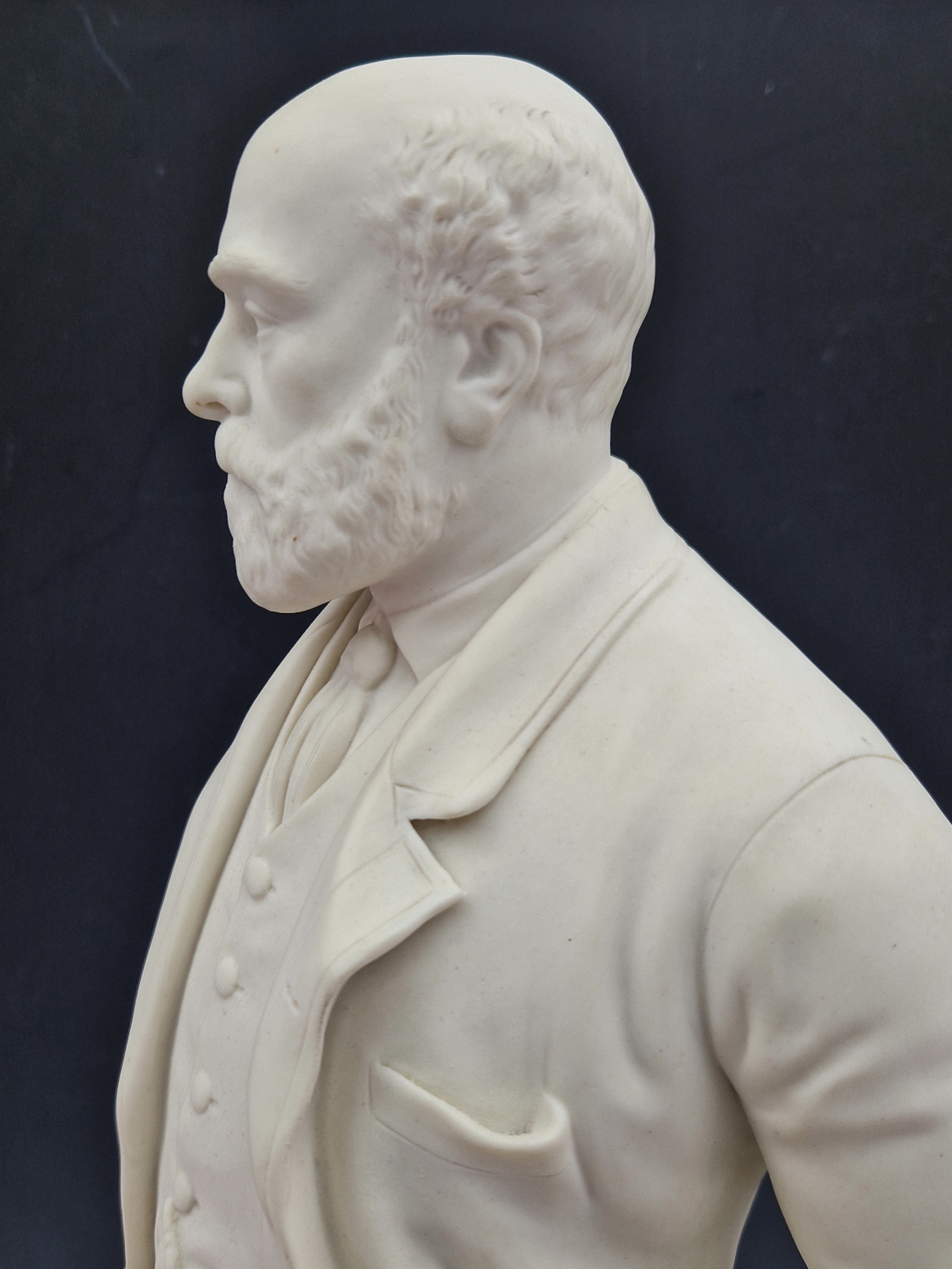 A 19th C. PARIAN FIGURE OF COLIN MINTON CAMPBELL STANDING HOLDING A CUP ON A COLUMN MOULDED THIS - Image 8 of 11