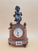 A TERRACOTTA PINK MARBLE AND BRONZE CASED TIMEPIECE WITH A PLATFORM ESCAPEMENT, CUPID DRINKING