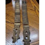 A PAIR OF LEATHER LINED BRASS FLEXIBLE STRAPS TO FIX A LIFE GUARDS CUIRASS OVER HIS SHOULDERS
