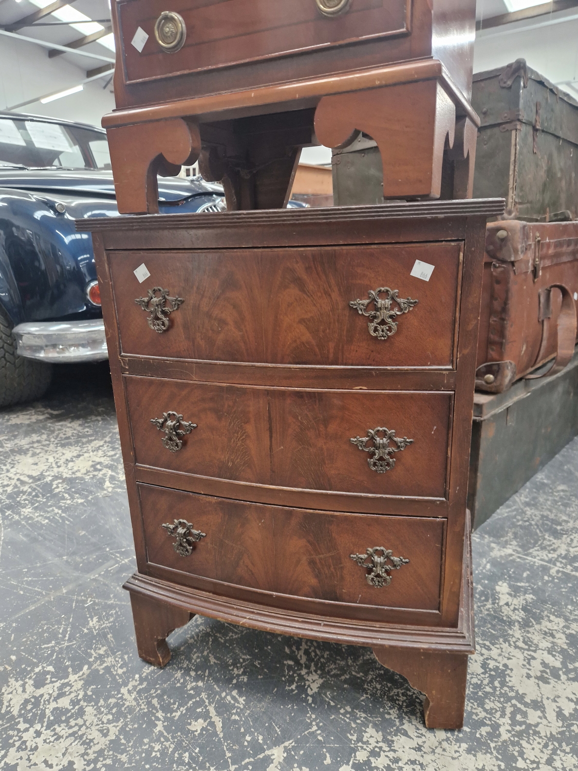 TWO 20th C. MAHOGANY CHESTS, ONE FLAT FRONTED WITH FOUR DRAWERS, THE OTHER BOW FRONTED AND WITH - Image 2 of 3