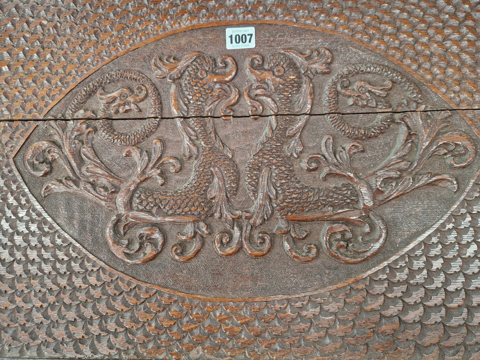 AN OAK BRASS HANDLED TRAY RELIEF CARVED WITH AN OVAL OF TWO MYTHICAL BEASTS WITHIN FISH SCALE CHIP - Image 2 of 3