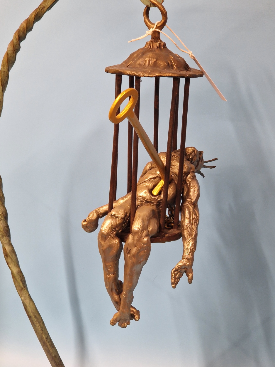 FELIPE GONZALEZ, A CONTEMPORARY BRONZE SCULPTURE OF A MAN IN A CAGE HELD ON A BRACKET ARM RESTING ON - Image 13 of 13