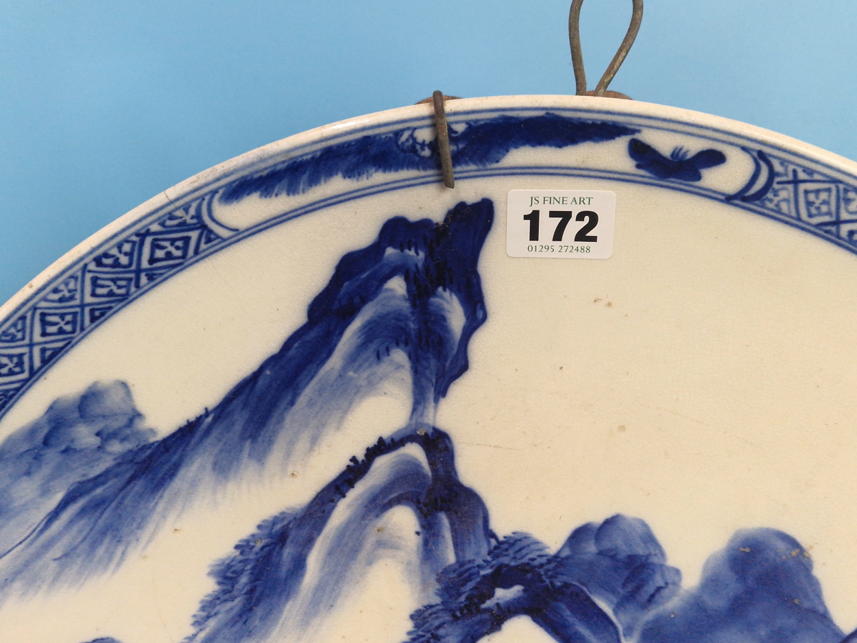 A PAIR OF CHINESE BLUE AND WHITE CHARGERS PAINTED WITH MOUNTAINOUS ISLANDS, A BUFFALO ON ONE AND A - Image 3 of 14