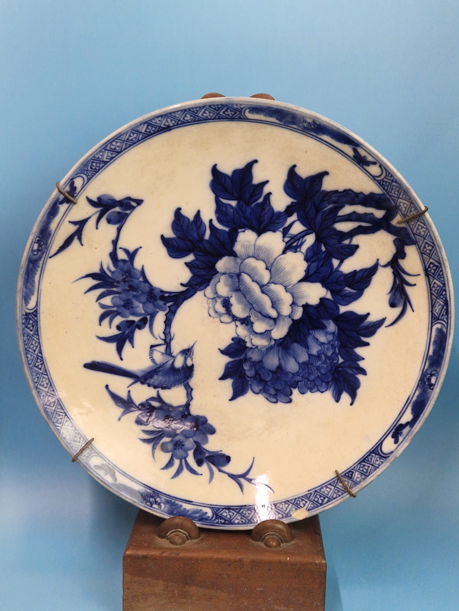 TWO CHINESE POTTERY BLUE AND WHITE CHARGERS, ONE PAINTED WITH A BIRD PERCHED ON A CHERRY BLOSSOM - Image 4 of 9