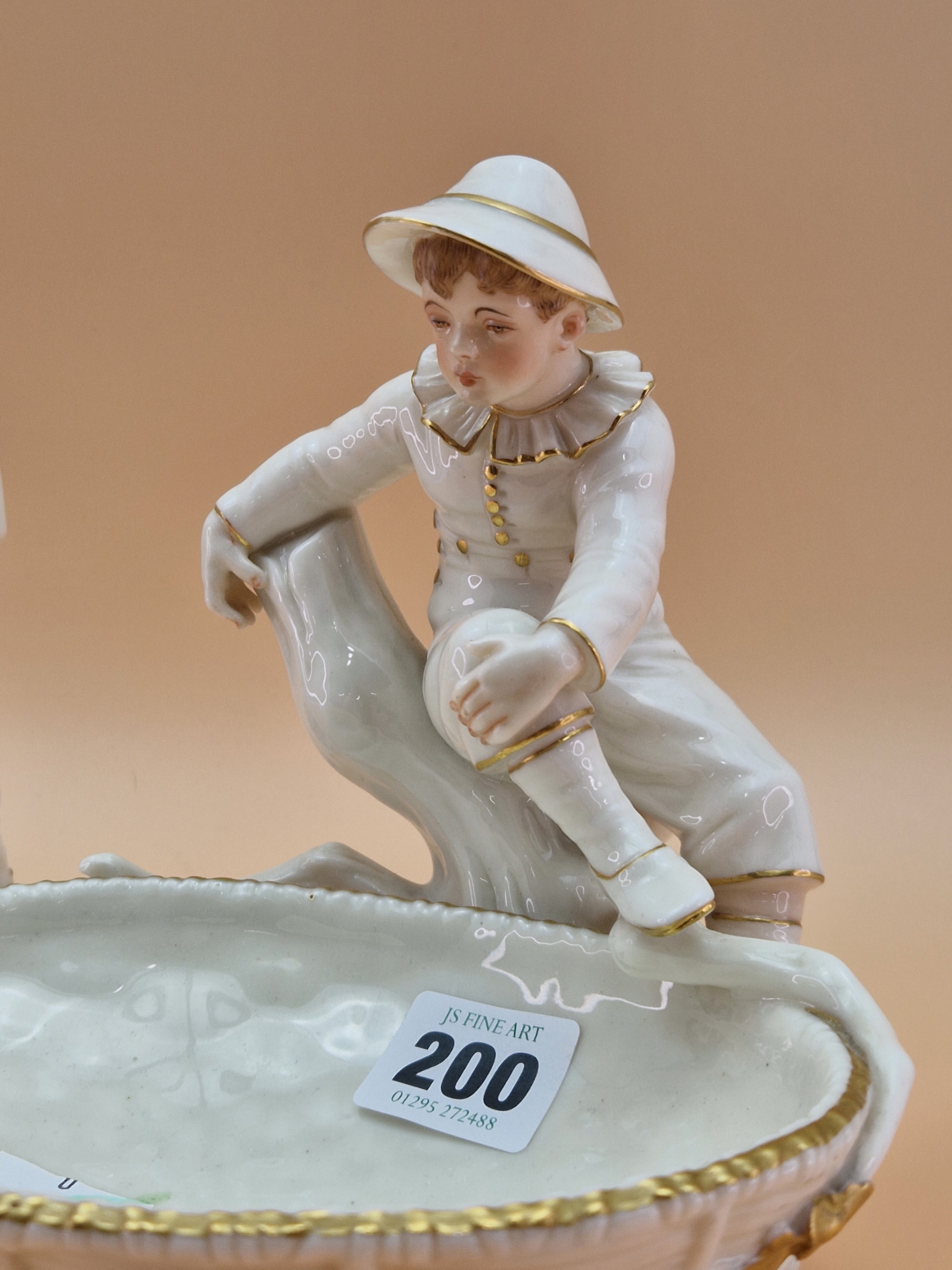 A VICTORIAN ROYAL WORCESTER FIGURE OF A BOY SEATED ON A BRANCH OVERLOOKING A GILT EDGED BASKET. W - Image 2 of 9
