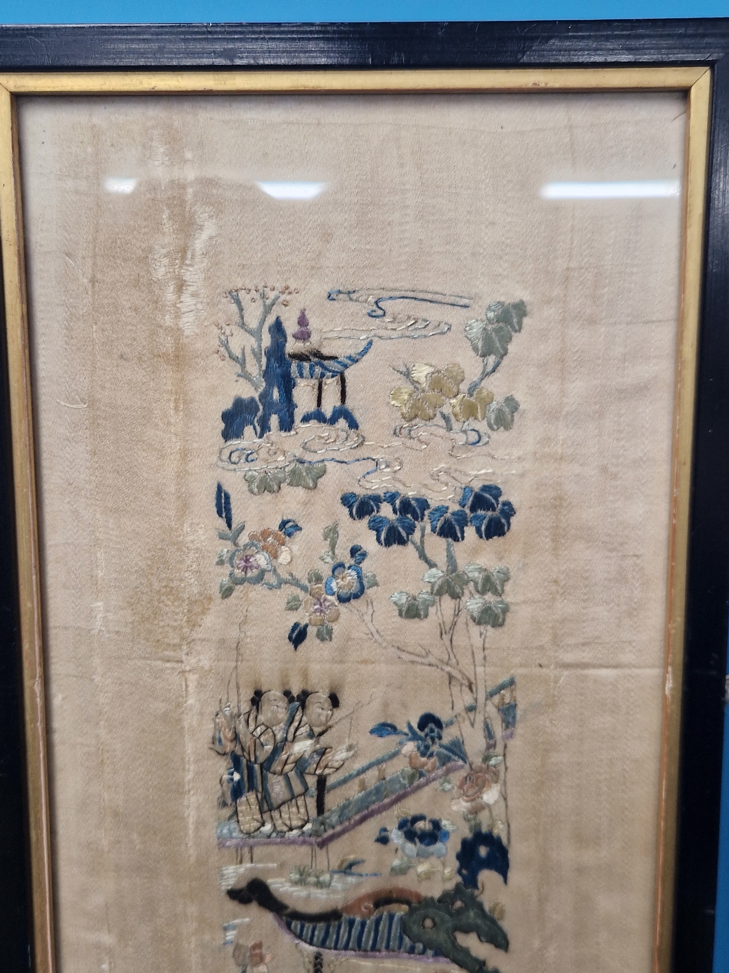 A PAIR OF FRAMED CHINESE SILK SLEEVE PANELS SEWN WITH FIGURES GOING ABOUT VILLAGE PURSUITS ON - Image 8 of 8