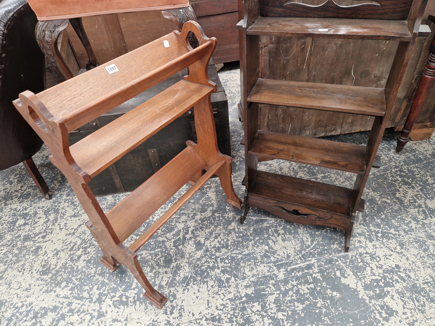 AN ARTS AND CRAFTS OAK BOOK STAND TOGETHER WITH A SMALL OAK BOOKCASE