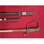 A WW I MAUSER BAYONET TOGETHER WITH GERMAN? DRESS SWORD AND AN ASSOCIATED SCABBARD.