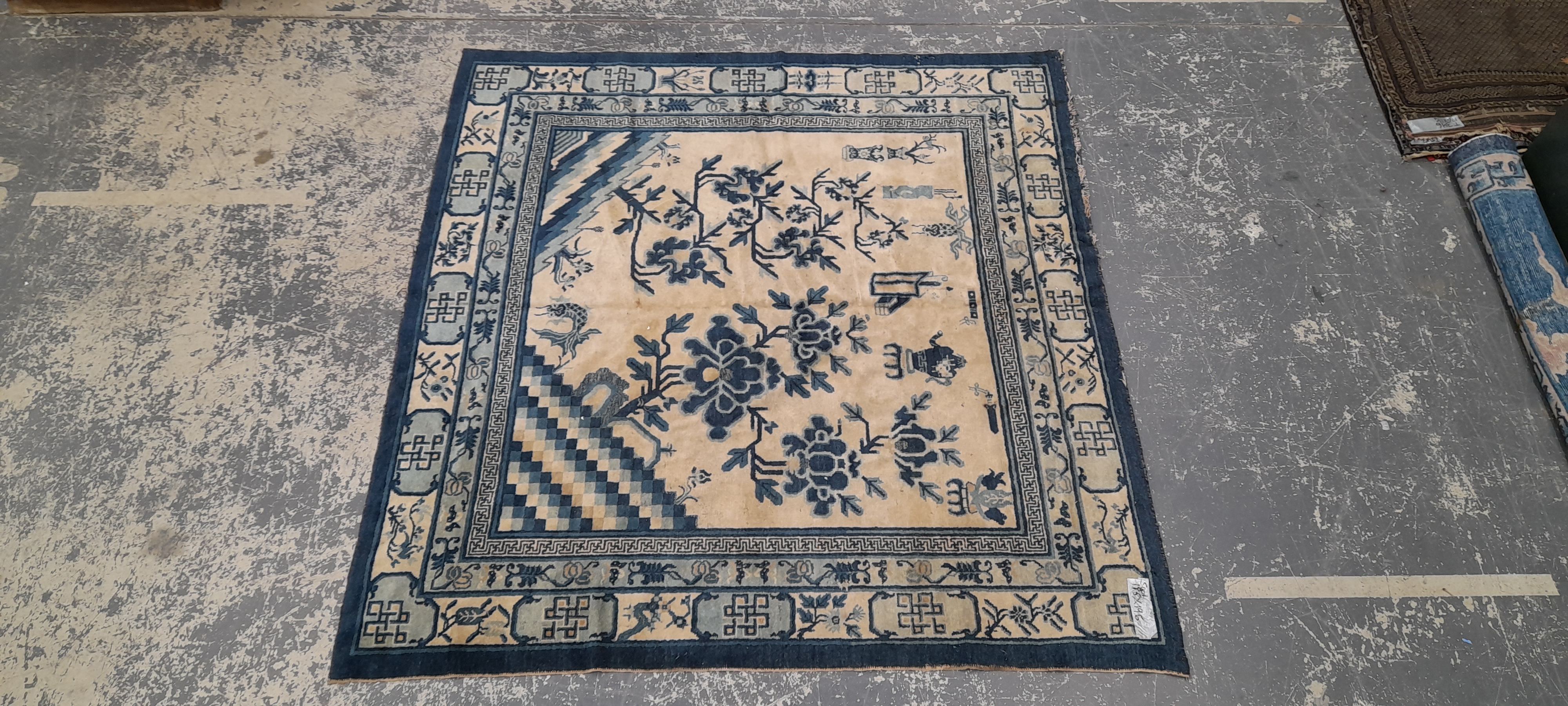 AN ANTIQUE CHINESE SAMPLE RUG 196 x 185 cm