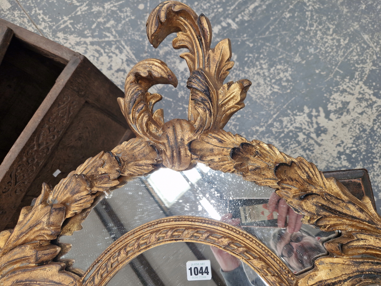 AN OVAL MIRROR WITHIN A FOLIATE GILT FRAME. 130 x 71cms. - Image 2 of 5