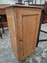 A PINE BEDSIDE CUPBOARD