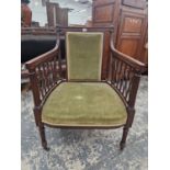 A REGENCY STYLE MAHOGANY DESK CHAIR, THE RECTANGULAR BACK SPLAT AND SEAT UPHOLSTERED IN GREEN