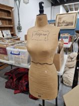 A VINTAGE DRESSMAKERS DUMMY