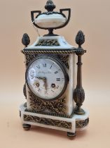 AN ORMOLU MOUNTED WHITE MARBLE CASED MARTI CLOCK RETAILED BY LE ROY & FILS, THE MOVEMENT STRIKING ON