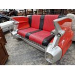 A MID CENTURY STYLE DINER SEAT FORMED AS THE TAIL END OF A CADILLAC