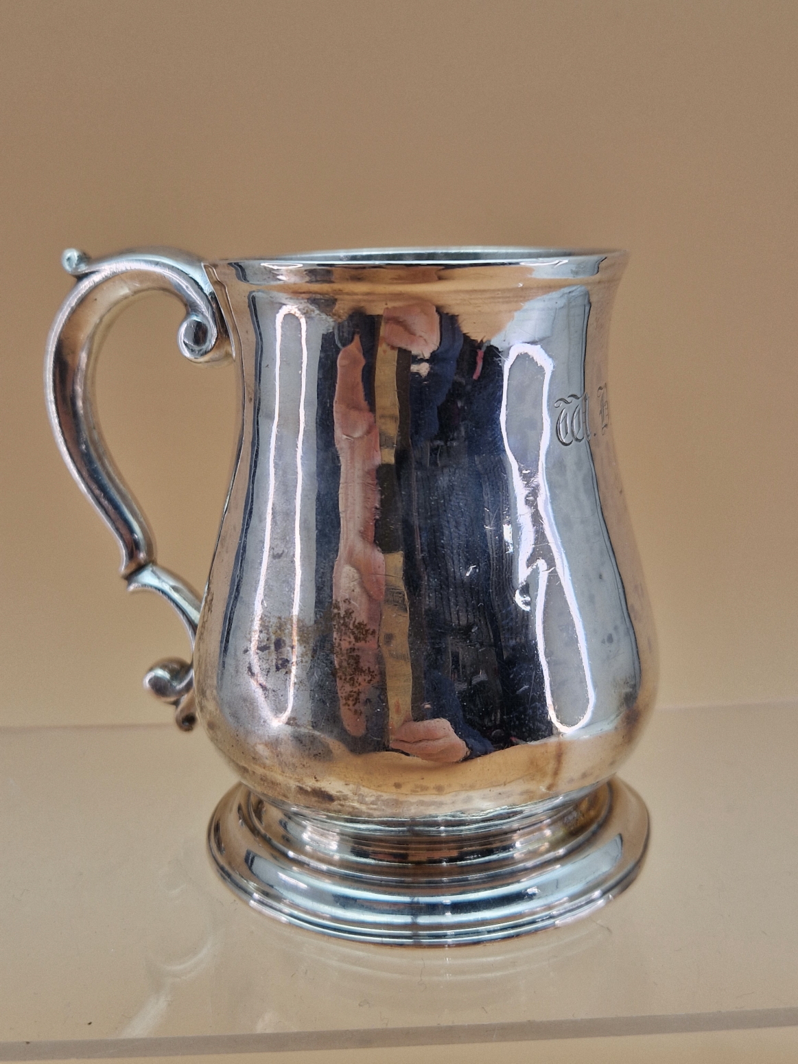 A SILVER HALF PINT MUG BY WILLIAM GRUNDY, LONDON 1754, THE BALUSTER SHAPE INITIALLED OPPOSITE THE