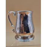 A SILVER HALF PINT MUG BY WILLIAM GRUNDY, LONDON 1754, THE BALUSTER SHAPE INITIALLED OPPOSITE THE