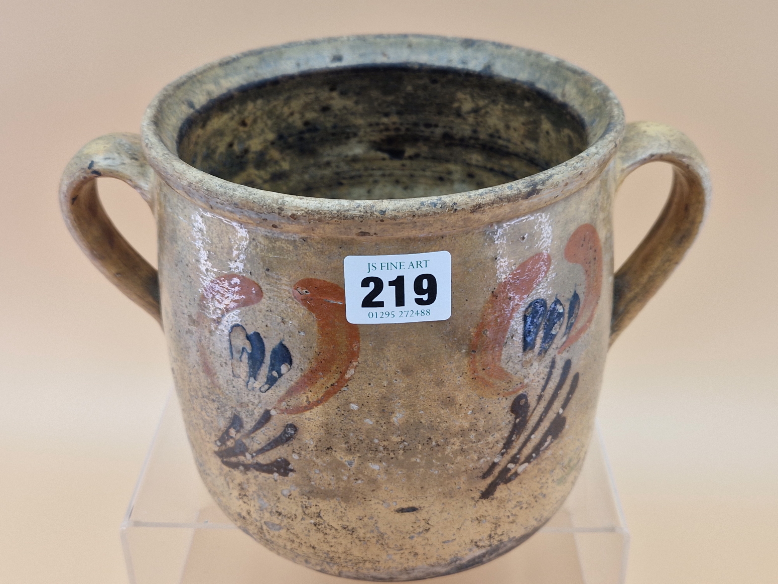 A TWO HANDLED BROWN POTTERY TWO HANDLED JAR PAINTED WITH STYLISED FLOWERS, POSSIBLY EARLY 20th C. - Image 2 of 6