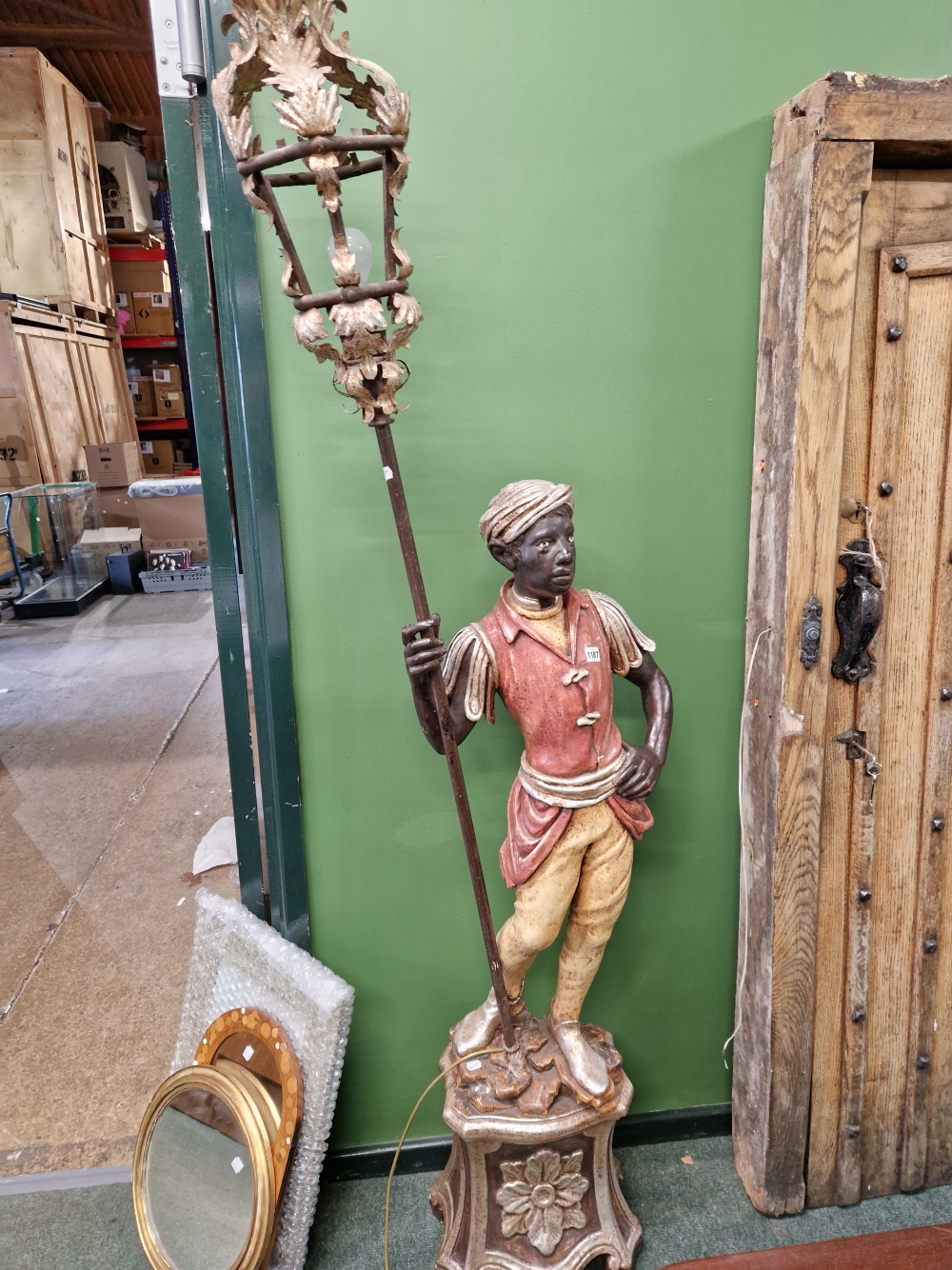 A PAIR OF VIENESE STYLE CARVED WOOD AND POLYCHROME DECORATED BLACKAMOOR FIGURES EACH SUPPORTING AN - Image 5 of 5