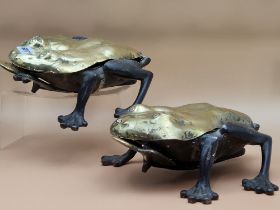 A PAIR OF BRASS AND IRON FROG FORM SPITTOONS, THE BRASS BODIES OPENING WITH THE AID OF TONGUE