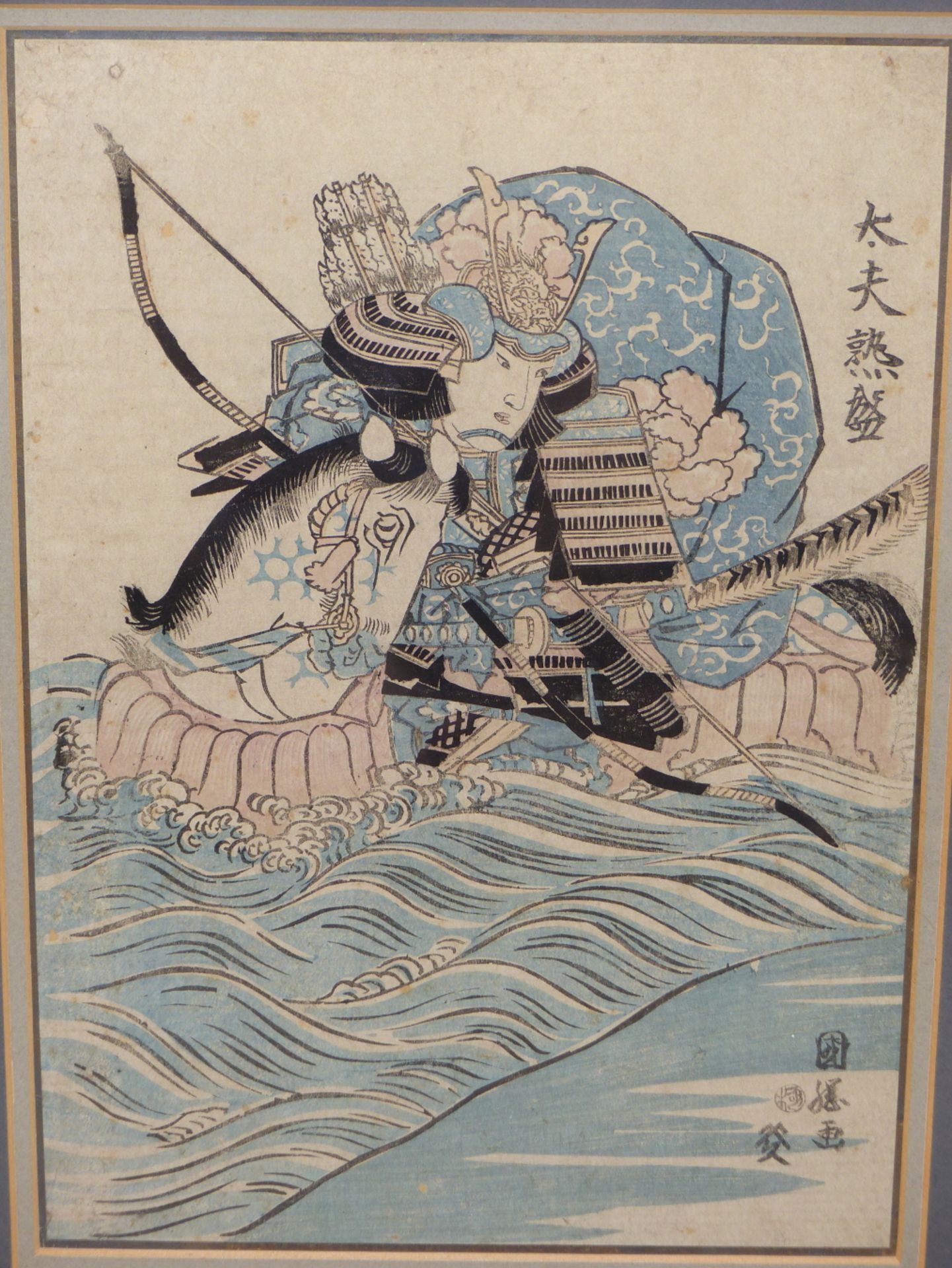 UTAGAWA KUNIKIYO, JAPANESE 1850-1887. SAMURAI IN FULL BATTLE DRESS RIDING HORSE IN THE SURF.