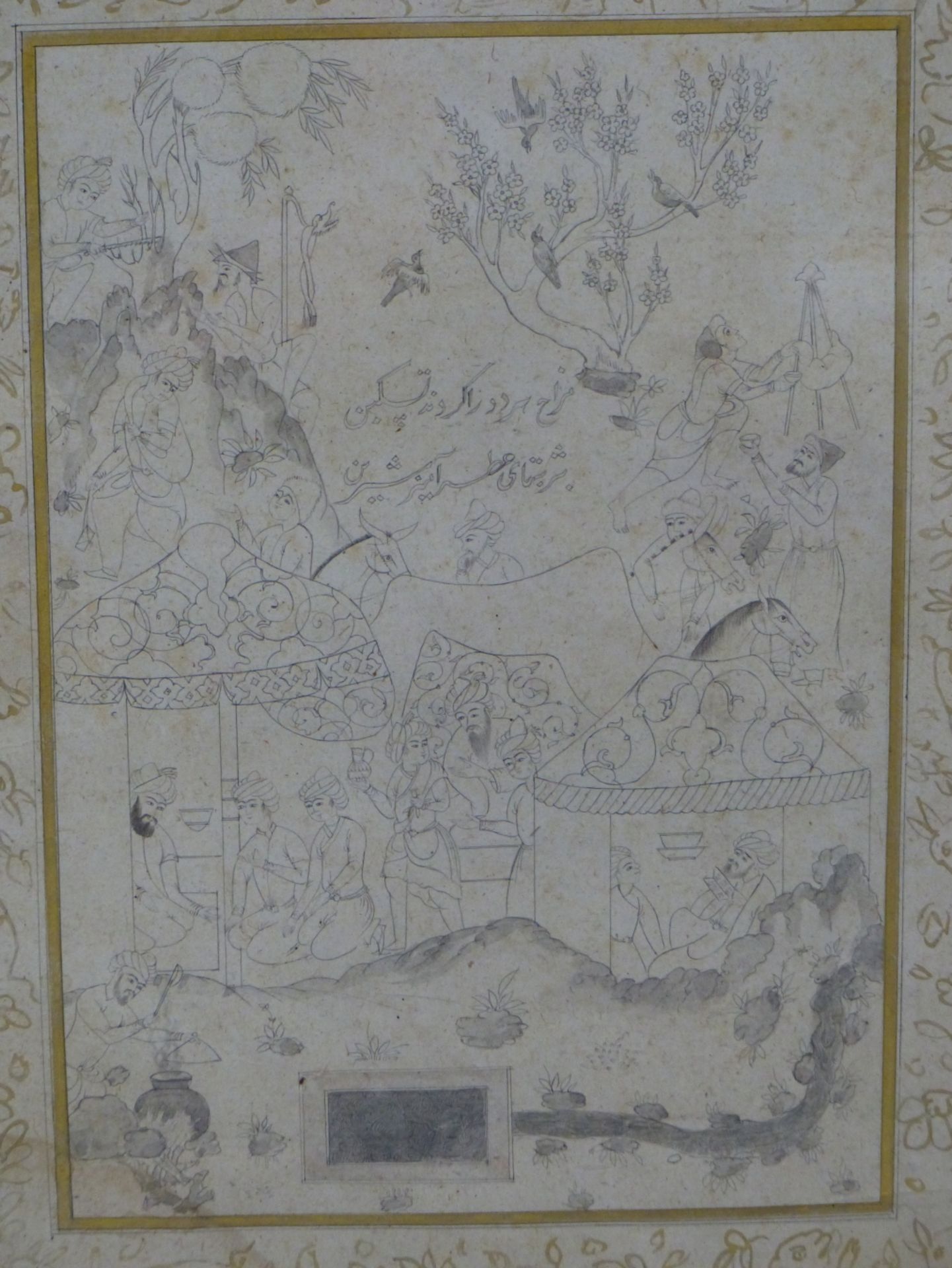 PERSIAN SCHOOL, 18THC. SAFAVID PAGE, DEPICTS A VILLAGE CELEBRATION WITHIN GILT BORDER OF ANIMALS.