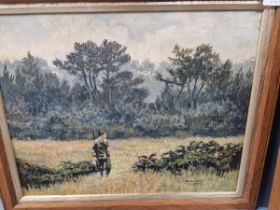F. BOURTAYRE, 20TH C. GAMEKEEPER AND DOG. OIL ON PANEL, 23 X 29 CM.