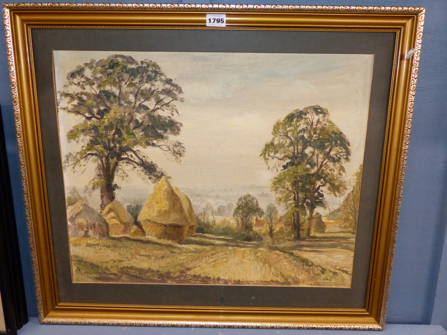 R.W. LUCKHURST (20TH CENTURY), HAYSTACKS AND ELM TREES IN AN EXTENSIVE LANDSCAPE, SIGNED AND DATED - Image 2 of 5