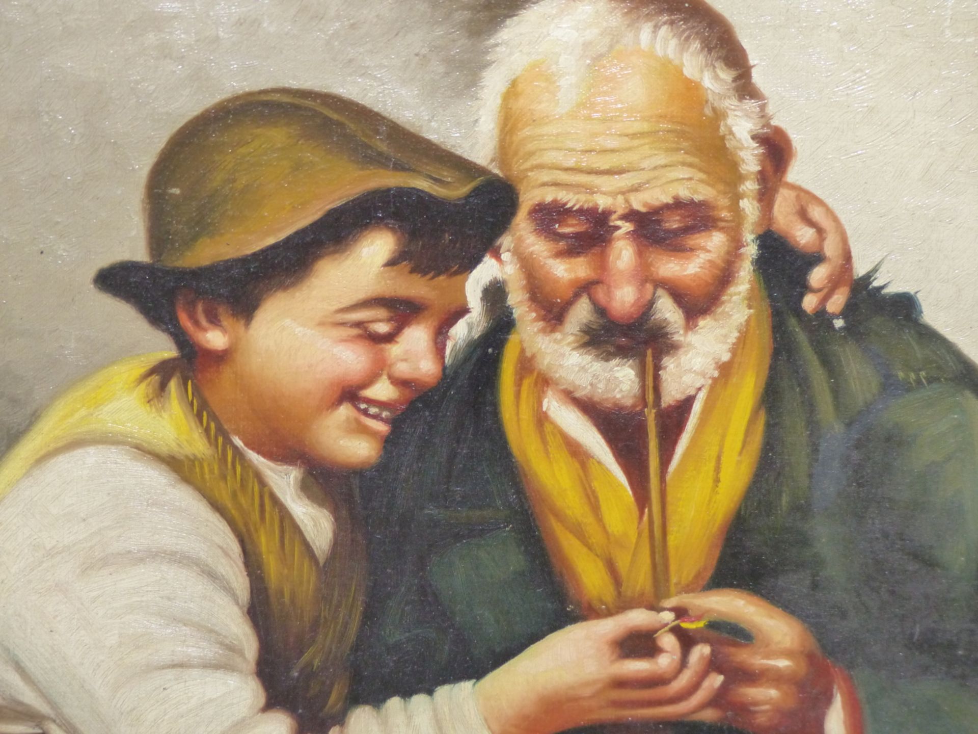 EUROPEAN SCHOOL (20TH CENTURY), YOUNG BOY HELPING AN OLD MAN TO LIGHT HIS PIPE, INDISTINCTLY SIGNED,