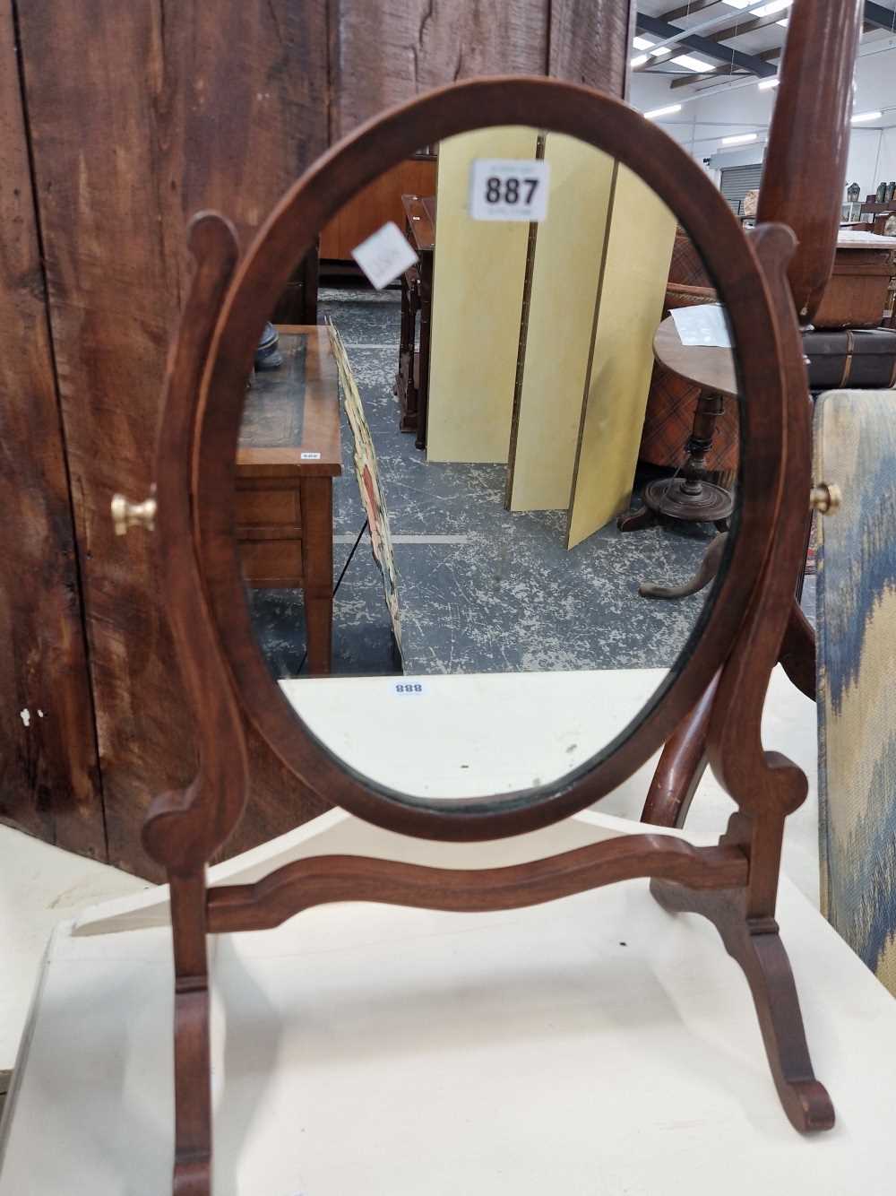 A swing mirror.