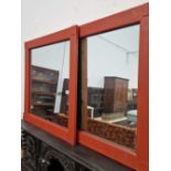 A pair of painted pine framed mirrors.