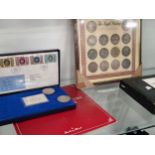 Cased commemorative coins and postage stamps