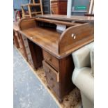 Antique oak roll top desk.