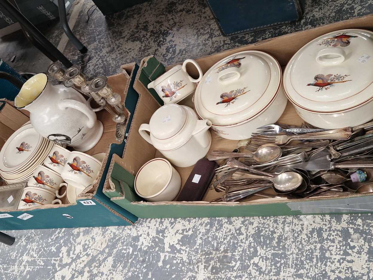 A cock pheasant decorated part dinner service, an electroplate candelabrum and cutlery