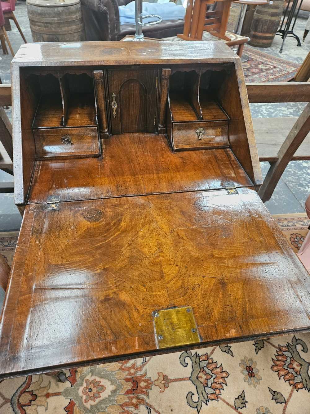 A 17th century style walnut bureau on stand. - Image 23 of 47