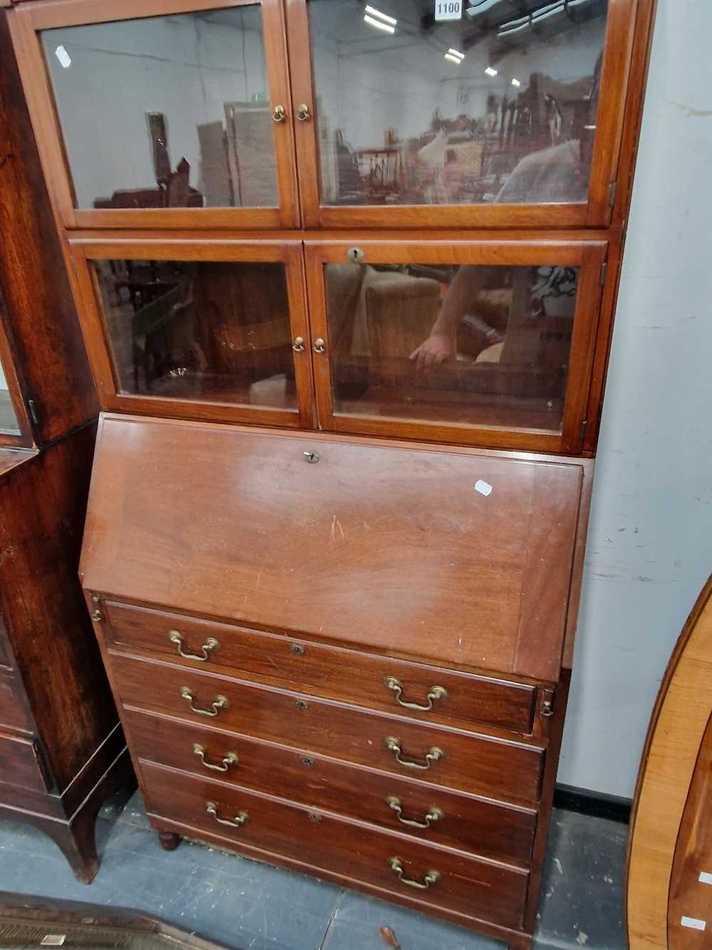 A small mahogany bureau bookcase.