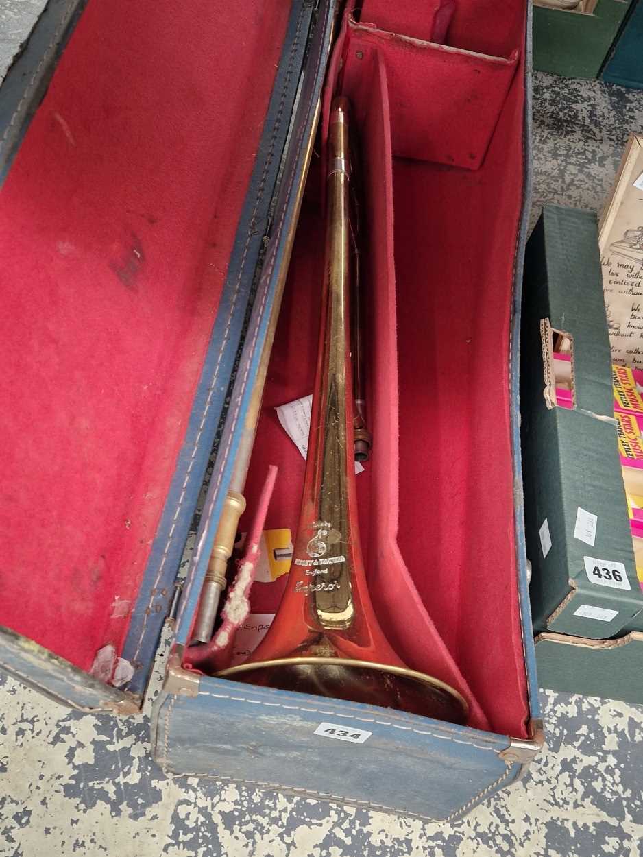 A cased Boosey and Hawkes trombone