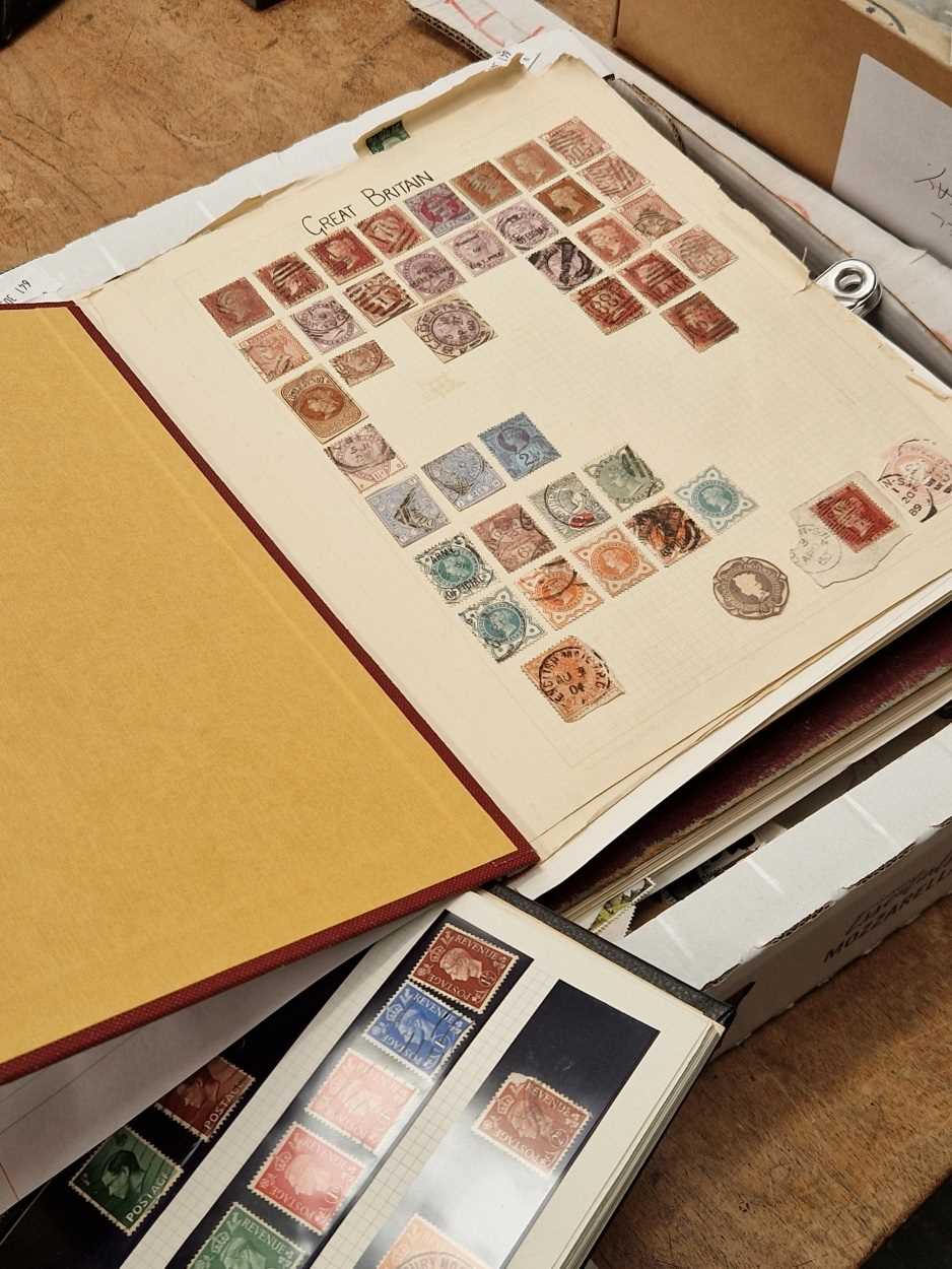 Four albums and some loose British postage stamps, mainly 20th C. but with a page including penny