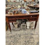 A 19th century mahogany writing table.