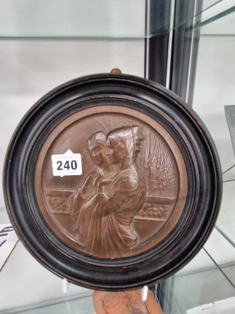 A framed bronze roundel with two sisters in relief, by Eric Bradbury EX. Royal academy 1914