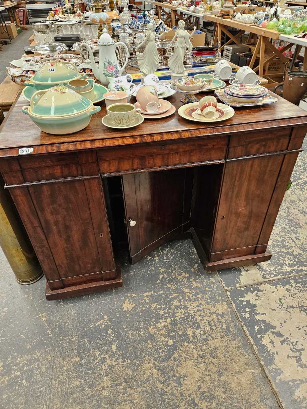 A William IV mahogany knee hole desk.