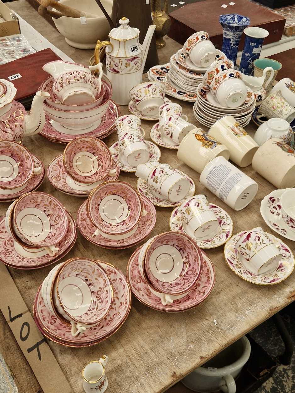 Pink lustre and Imari palette tea wares, a part Crown Derby coffee set, royal commemorative mugs,