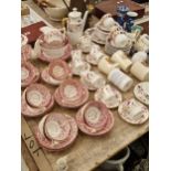 Pink lustre and Imari palette tea wares, a part Crown Derby coffee set, royal commemorative mugs,