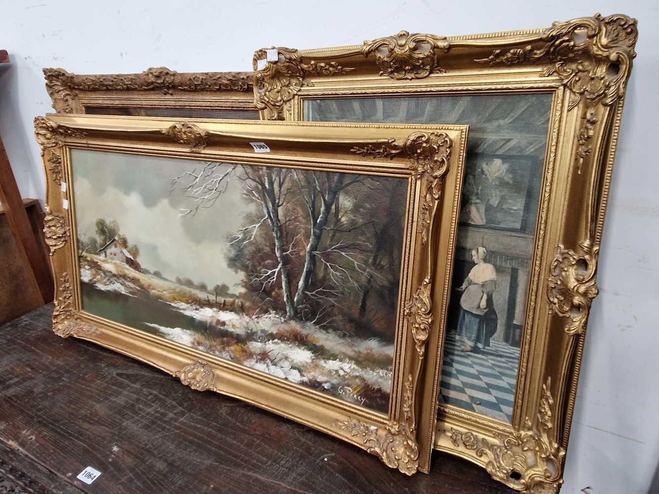 Two prints after the old masters and an oil on canvas landscape all in gilt frames.