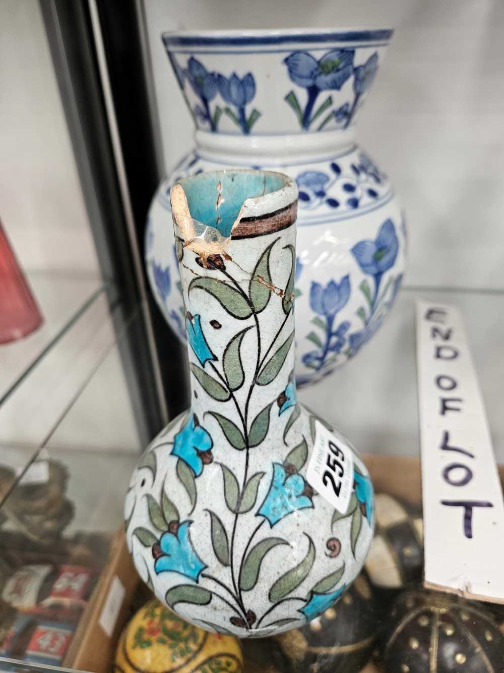 An William De Morgan Iznik bottle vase together a porcelain vase decorated with stems of blue - Image 13 of 15