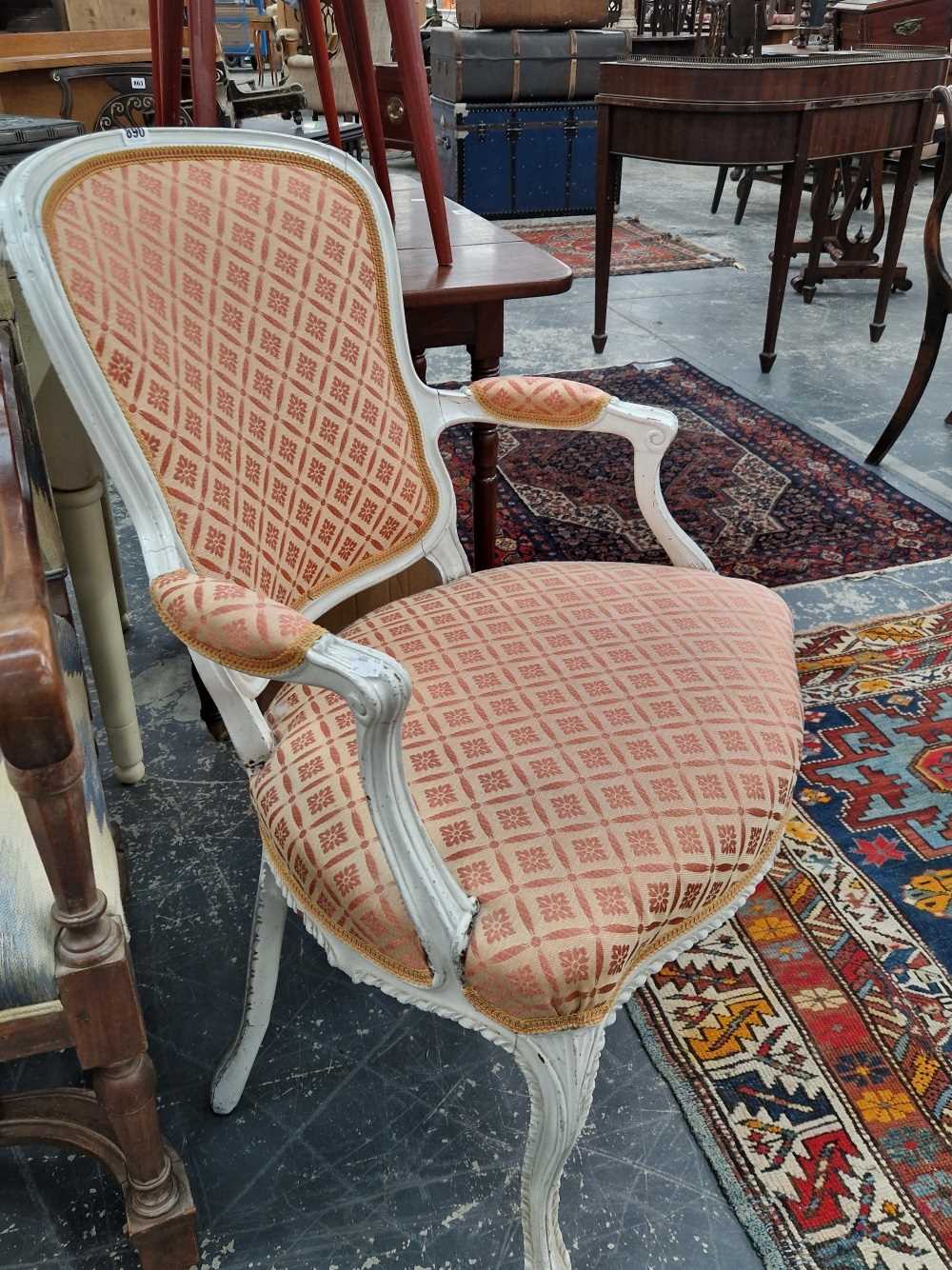 A French painted show frame armchair, together with a pair and one other occasional table.