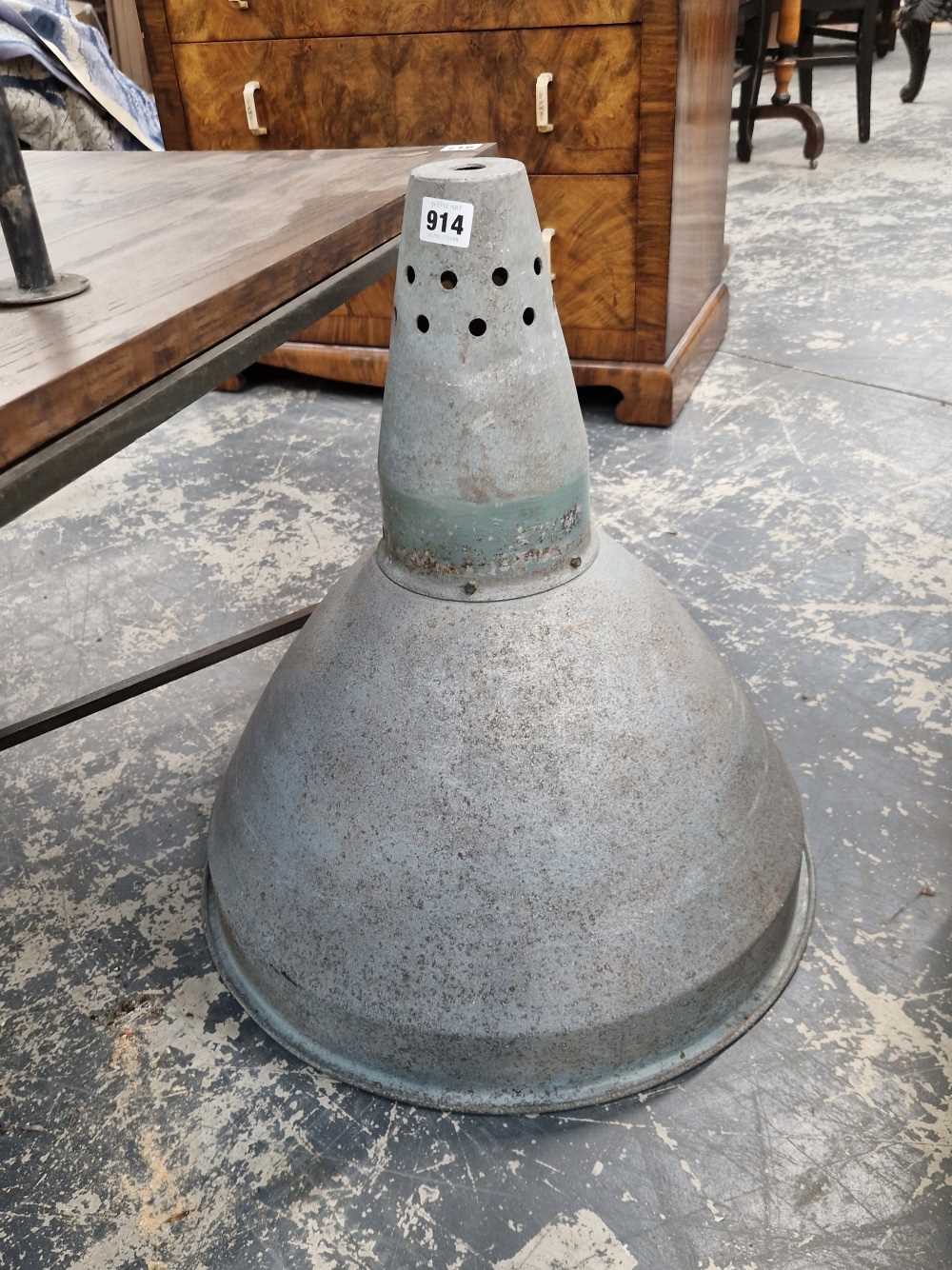 A pair of alloy industrial lightshades.