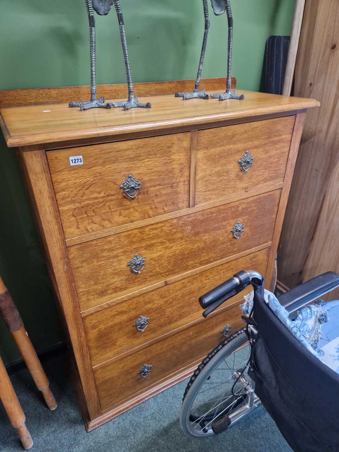 A Art Nouveau oak chest of deep drawers. H 125cm W 99cm D 46cm