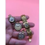 A 9ct hallmarked gold swiss ladies 15 jewel wrist watch on a 9ct gold unhallmarked expanding