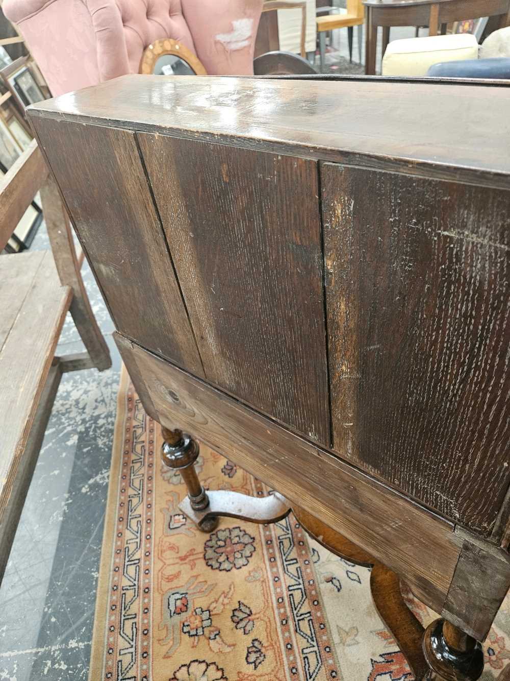 A 17th century style walnut bureau on stand. - Image 24 of 47